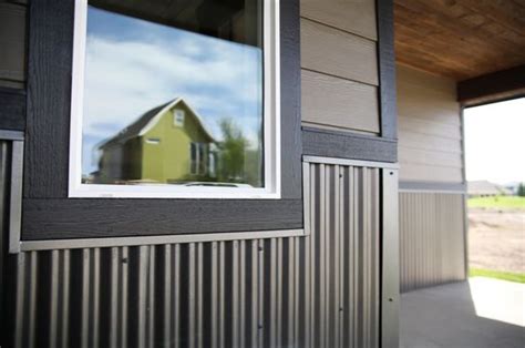 houses with vinyl siding with a metal wainscot|pros and cons of wainscoting.